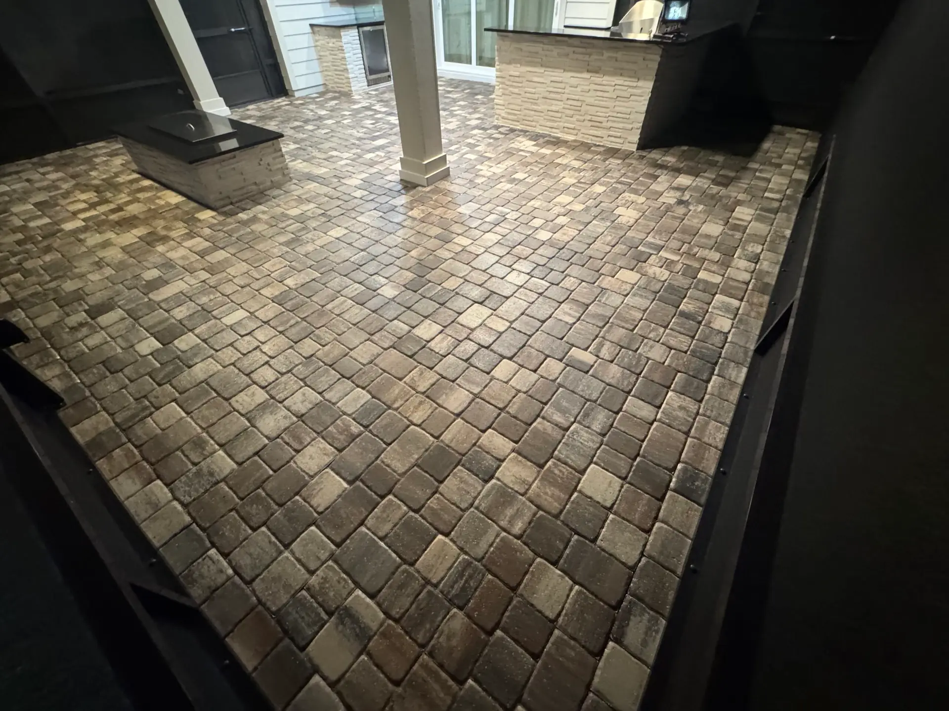 Restored paver walkway and entry after sanding and sealing