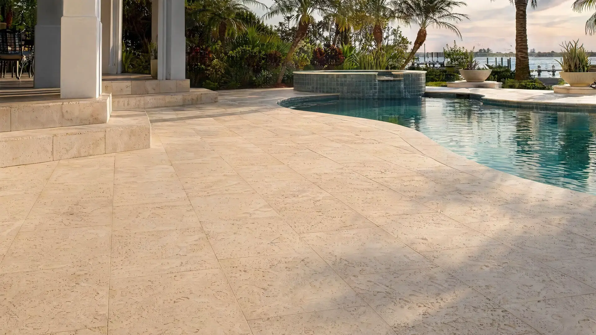 Travertine sealing before and after — restored stone pool deck by FCPE in Ponte Vedra Beach, FL