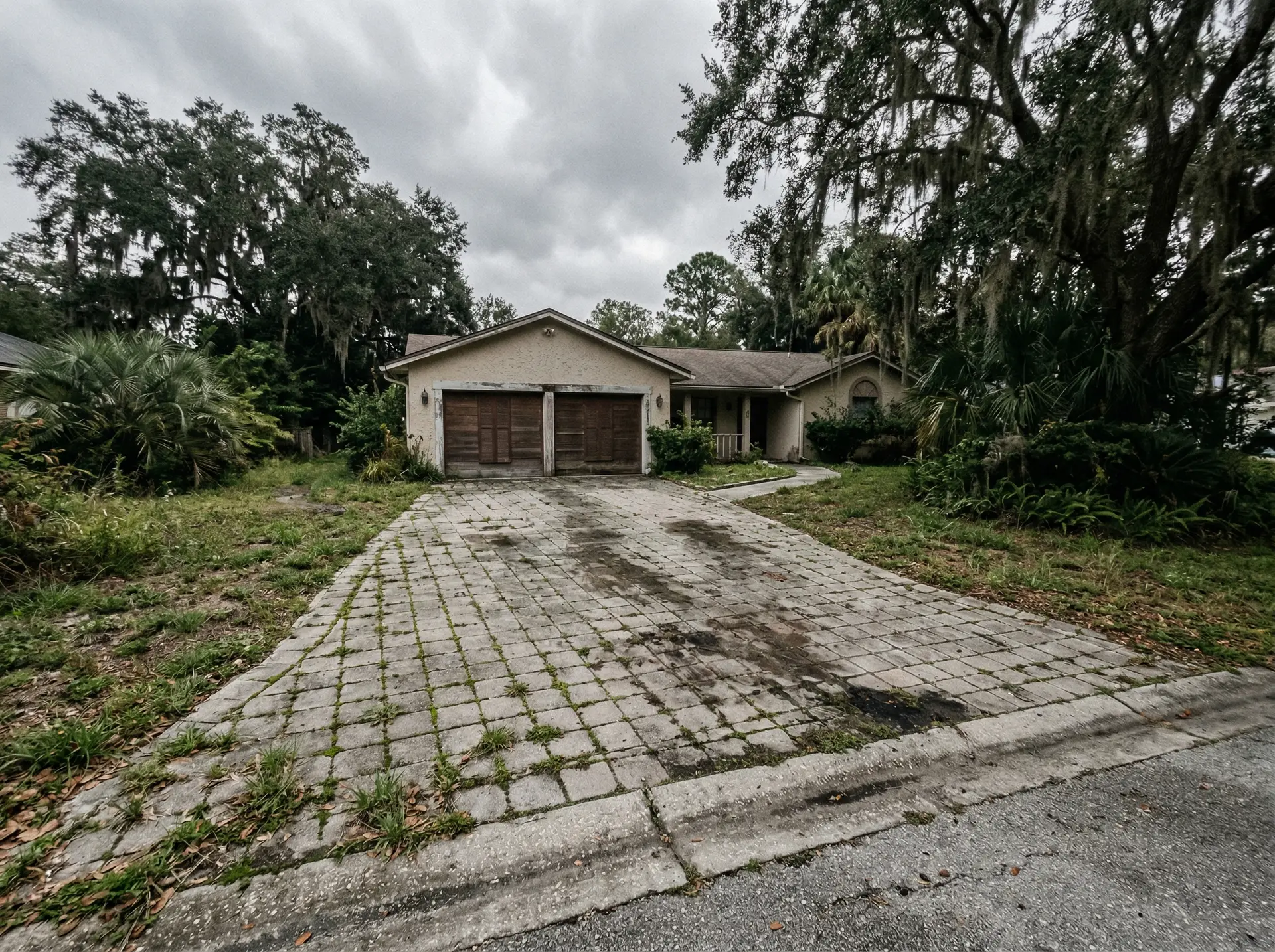 Faded pavers before professional cleaning and sealing